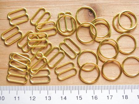 4 Schieber und 4 Ringe Metall in gold - 12mm