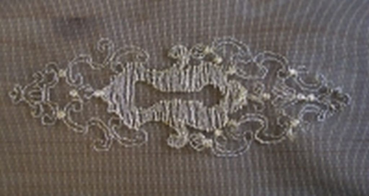 Spitzeneinsatz in schwarz/gold Lurex