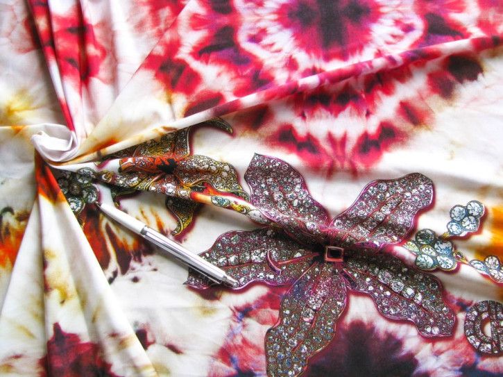1 Coupon / 1,4cm x 60cm bi-elastische Microfaser "Wild Thinks"